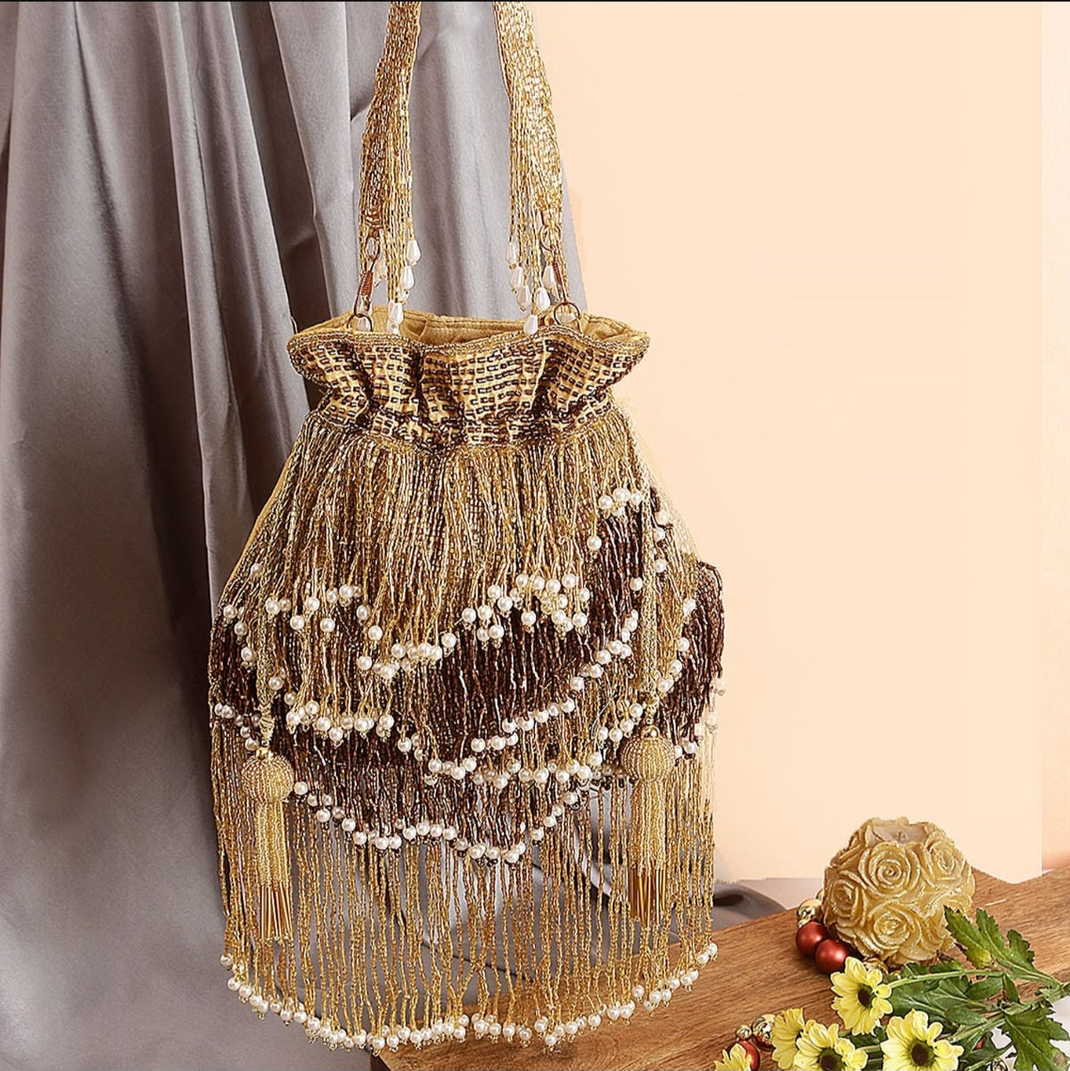Vanshika Golden Raw Silk Potli Bag